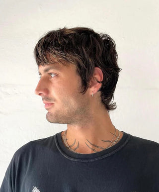 A maintenance haircut on a male by Alchemy Salon