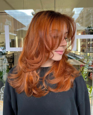 A wavy haircut by Alchemy Salon